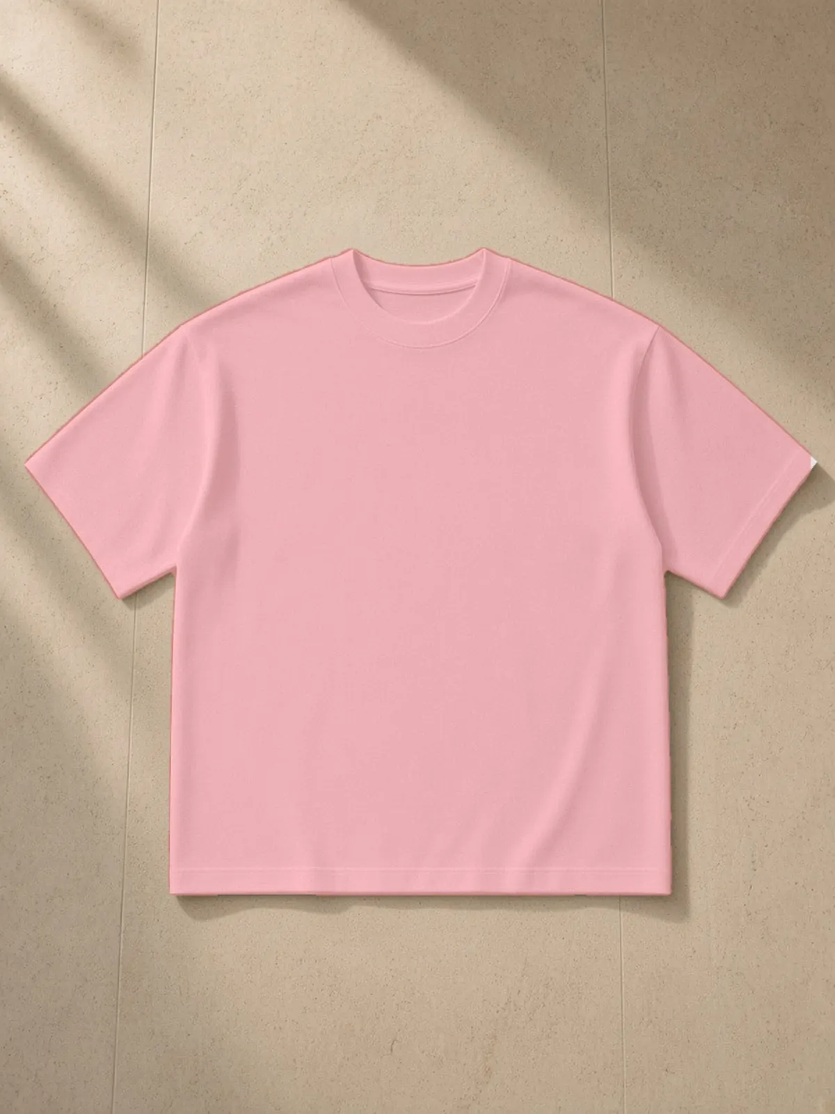 Boxy Mesh Crewneck T-Shirt — White & Pink, a Marcel Afters t-shirt, photographed flat on a warm studio backdrop.