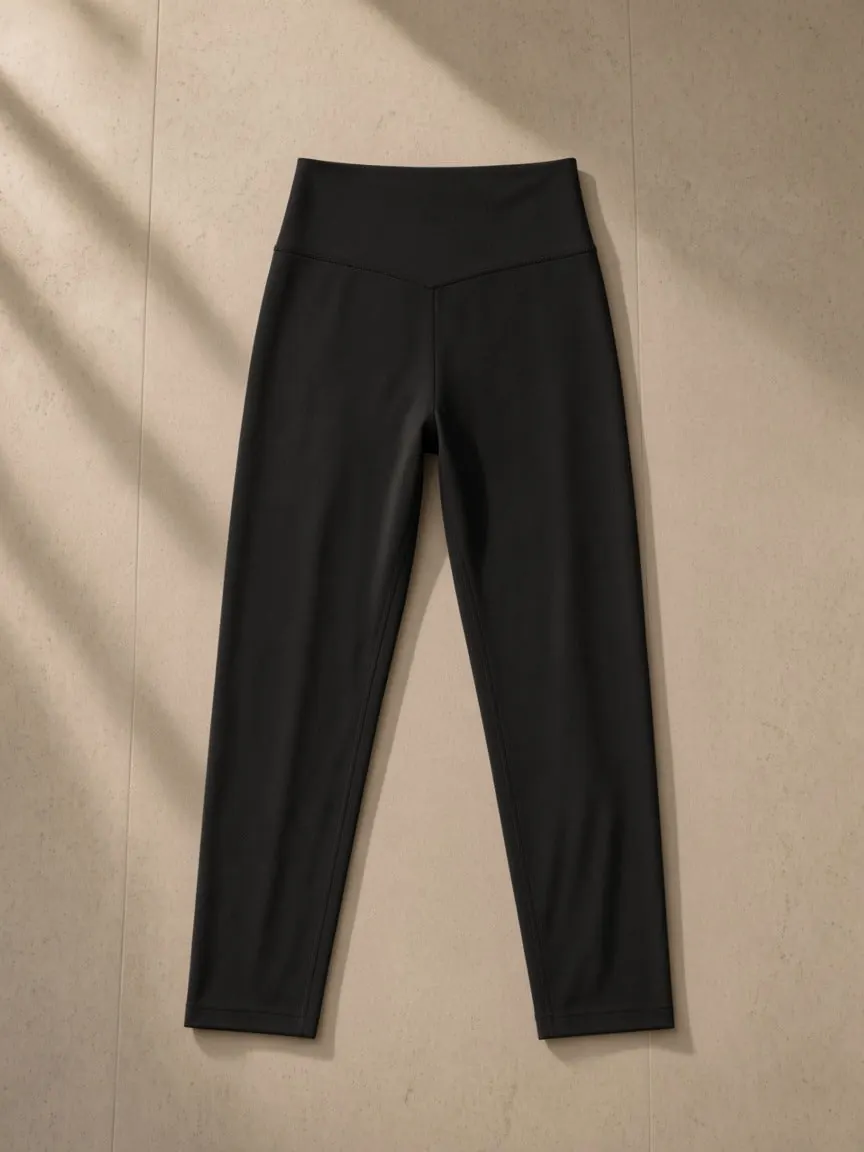High-Waisted Yoga Leggings, a Marcel Afters leggings, photographed flat on a warm studio backdrop.