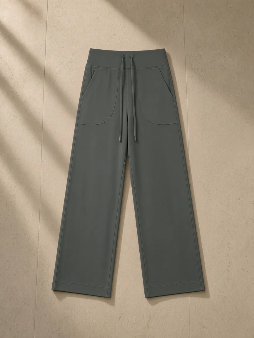 Women’s High Rise Straight Leg Yoga Pants, a Marcel Afters yoga pants, photographed flat on a warm studio backdrop.