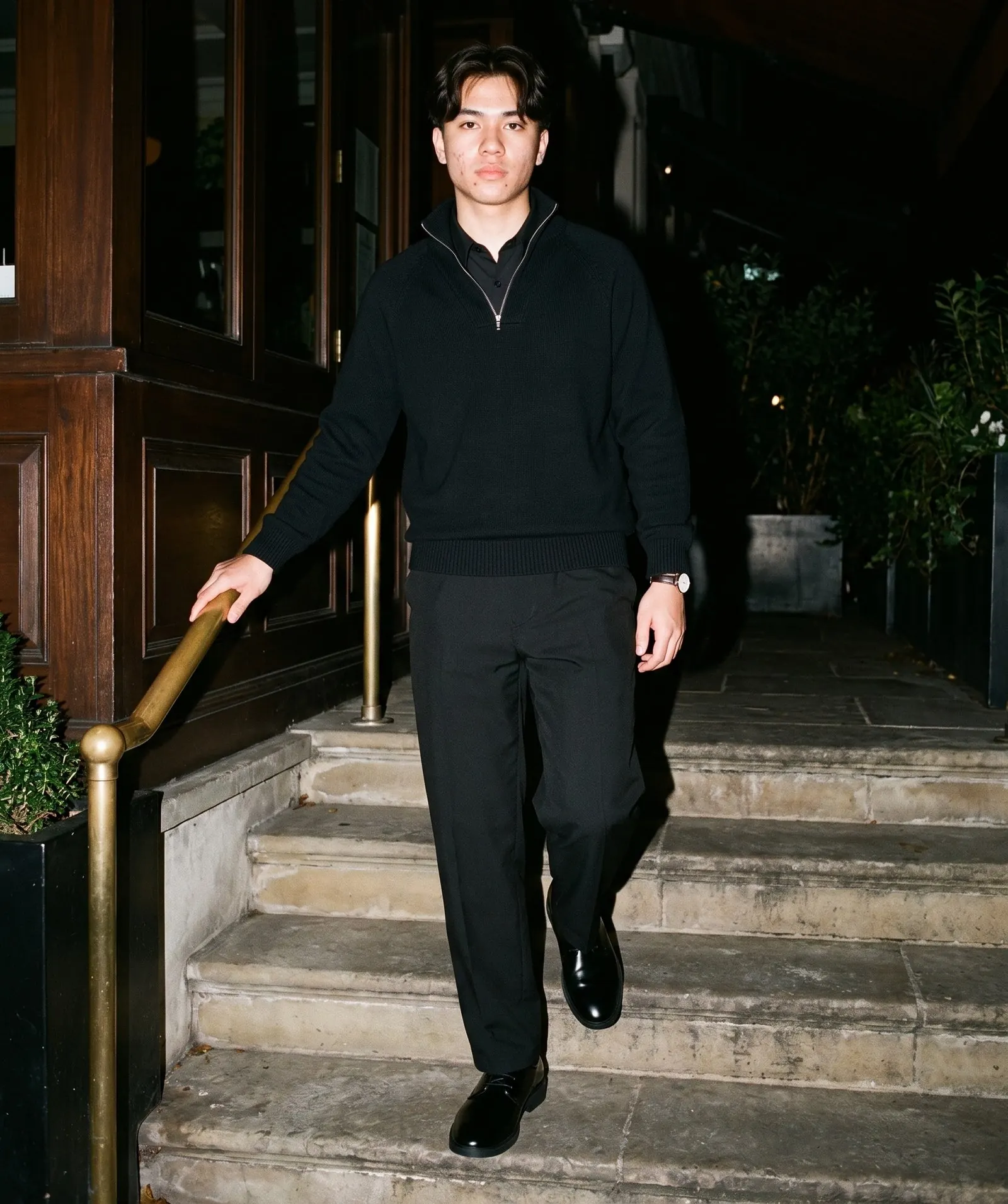 A model wearing The Black Car Derby by Marcel Afters, Autumn–Winter 2026.