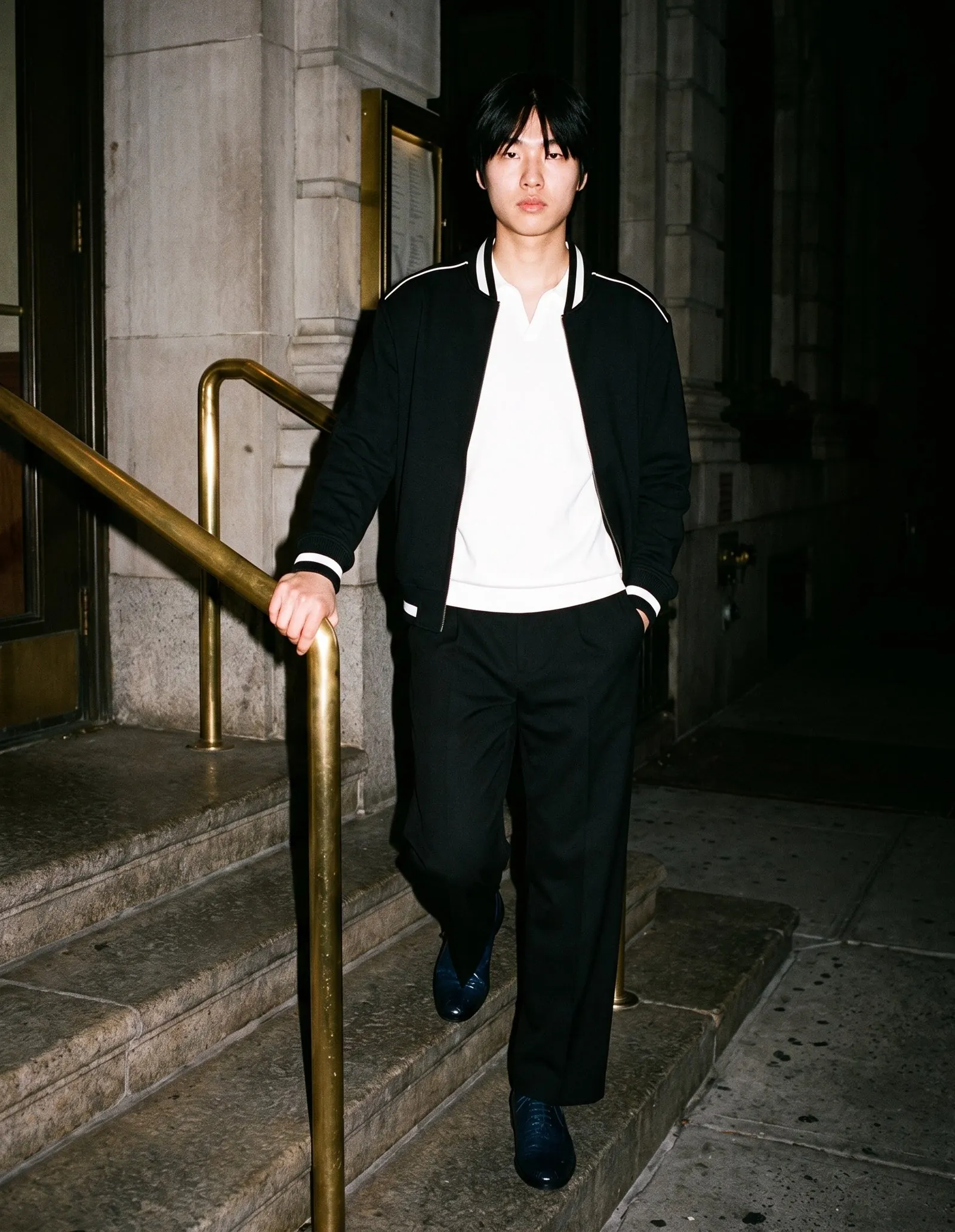 A model wearing The Blue Hour Oxford by Marcel Afters, Autumn–Winter 2026.
