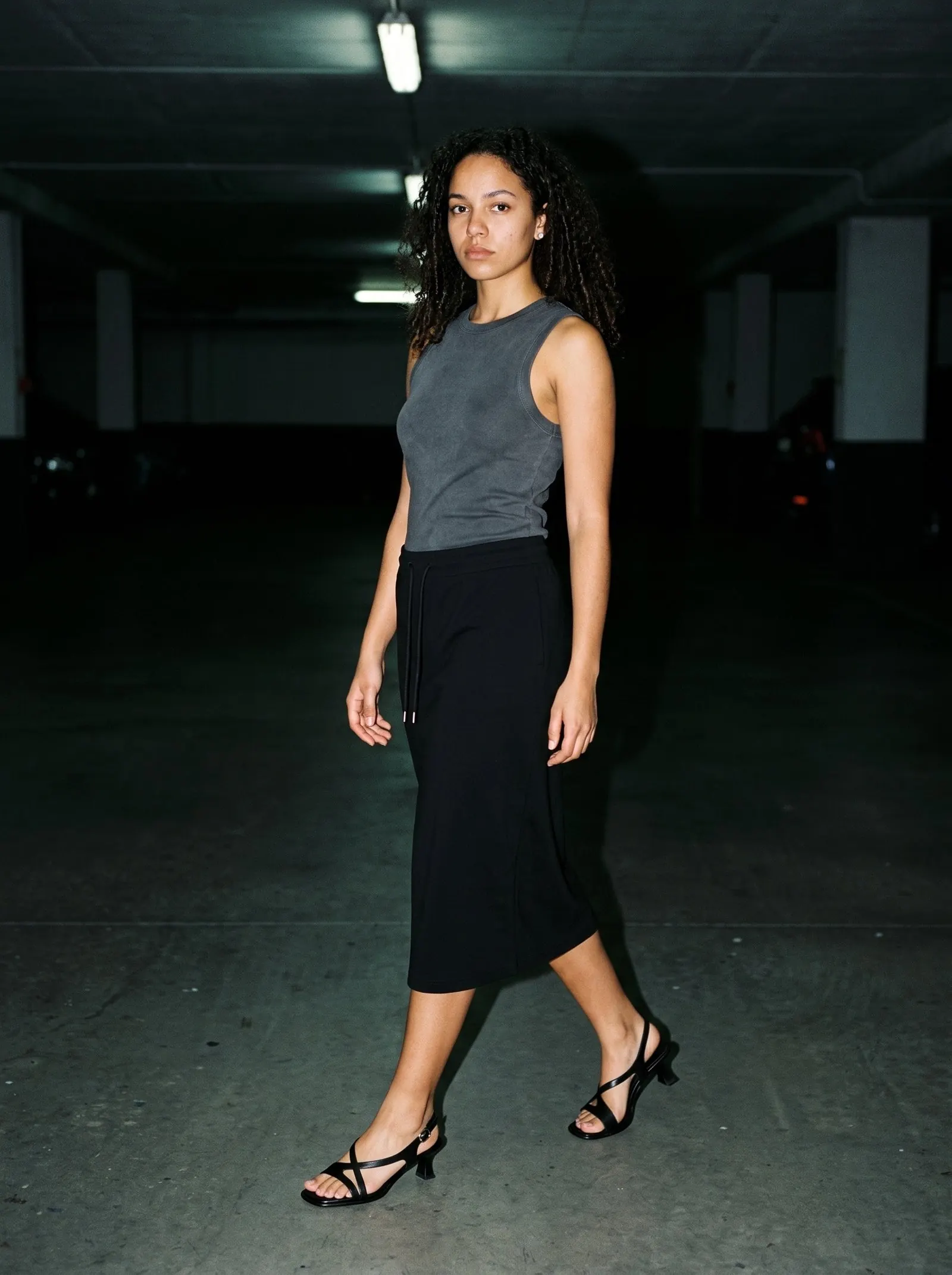 A model wearing The Late Lunch Sandal by Marcel Afters, Autumn–Winter 2026.