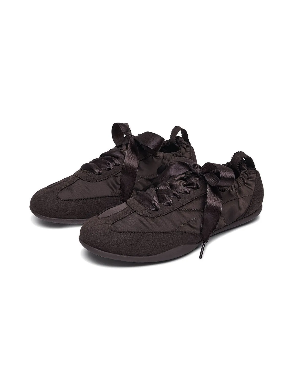 The Rehearsal Sneaker in espresso suede and satin, a pair on white.